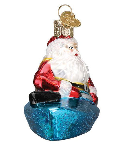 Santa In Kayak Ornament