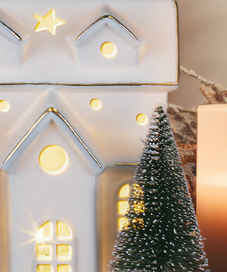 Lit Ceramic House With Trees